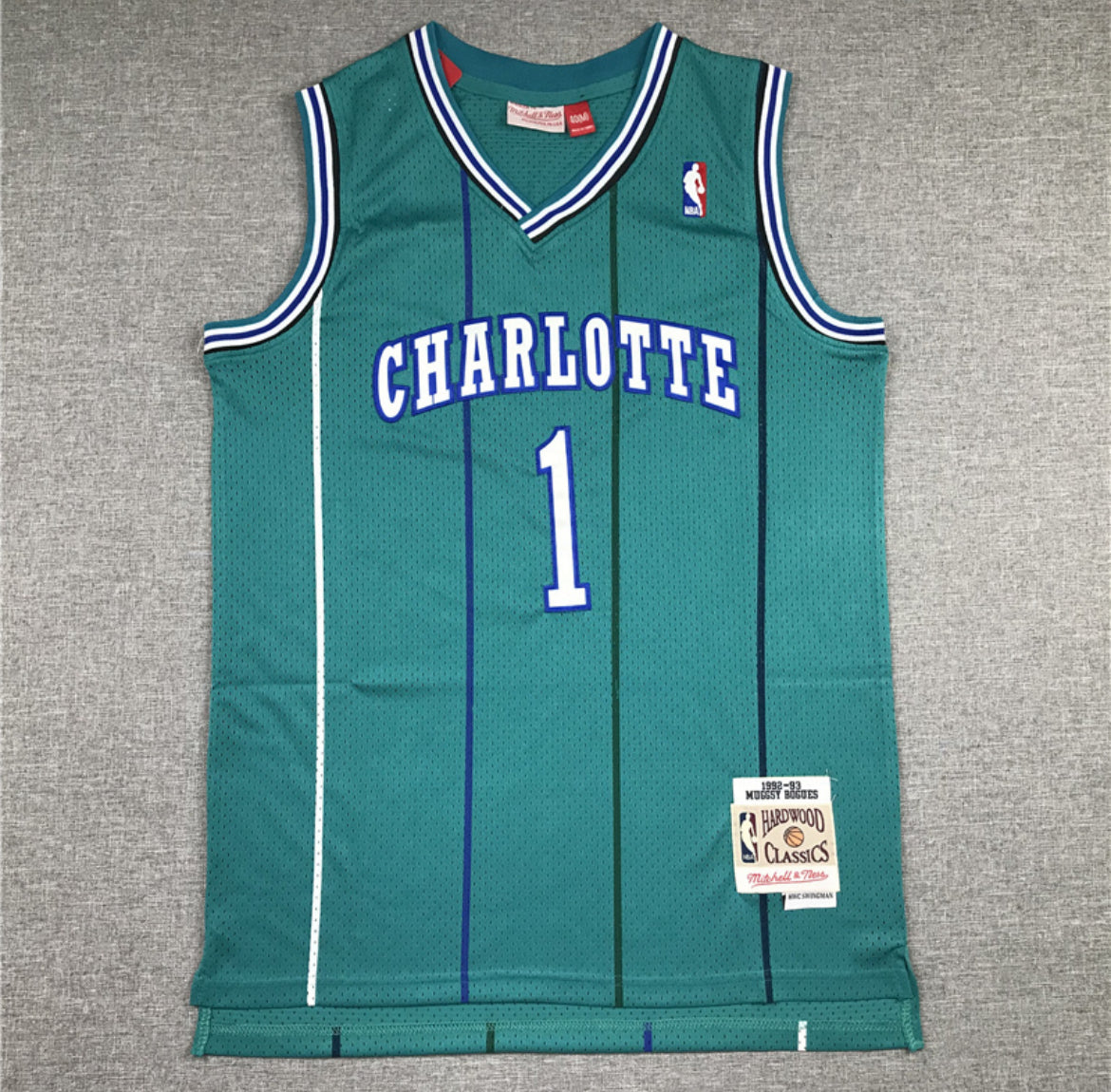 Muggsy Bogues #1 – Charlotte Hornets (Azul Clásico)